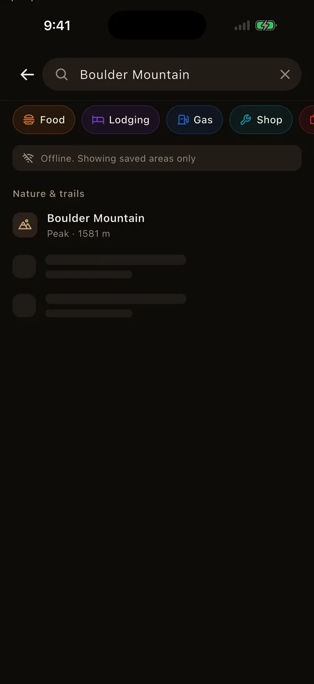The app with no signal inside a downloaded area, still finding a nearby peak in search